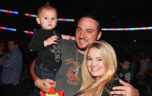pregnant Tiffany Thornton and Chris Carney with their first son