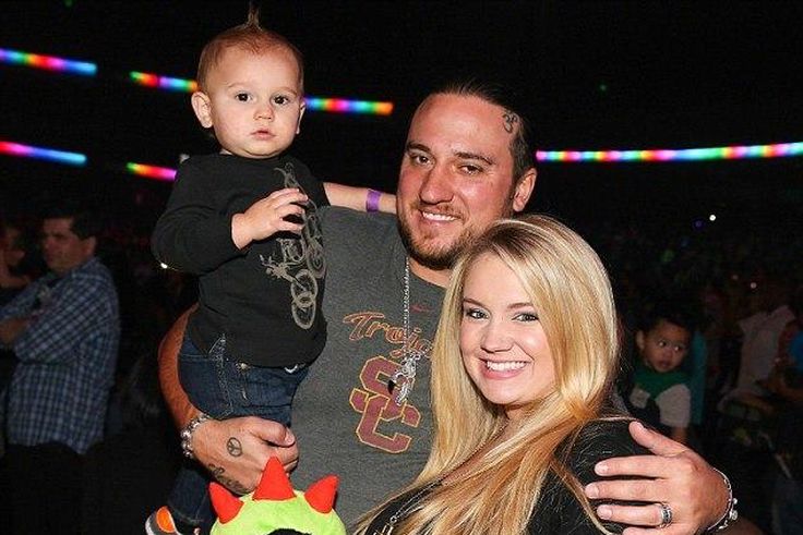 pregnant Tiffany Thornton and Chris Carney with their first son