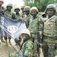 Nigerians soldiers destroy Boko Haram flag.