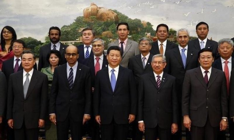 Chinese President Xi Jinping with delegates at the signing ceremony of the Asian Infrastructure Investment Bank in Beijing in October 2014.