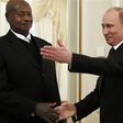 Russian President Vladimir Putin meets Uganda's President Yoweri Museveni