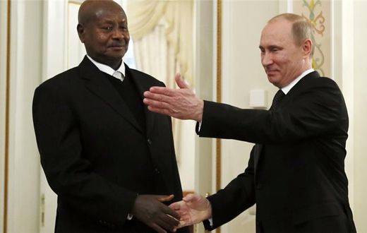 Russian President Vladimir Putin meets Uganda's President Yoweri Museveni