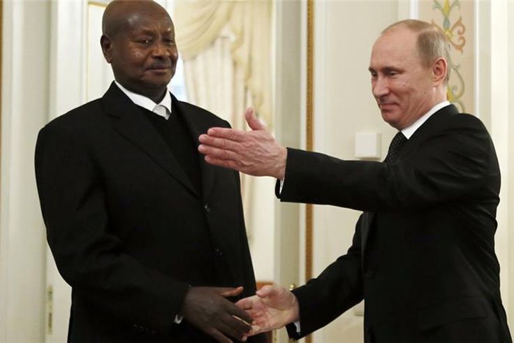Russian President Vladimir Putin meets Uganda's President Yoweri Museveni