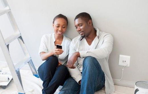 Couple looking a phone