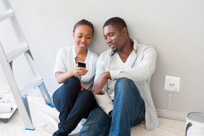 Couple looking a phone