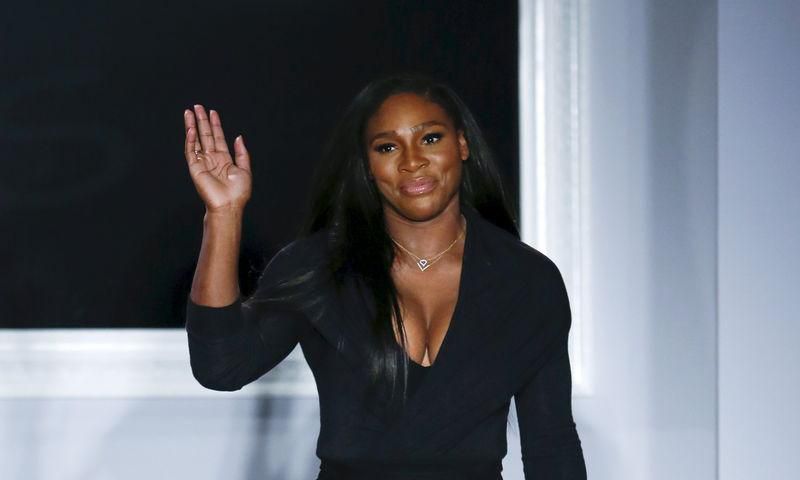 U.S. tennis player and designer Serena Williams acknowledges attendees after presenting her Spring/Summer 2016 collection during New York Fashion Week in New York, September 15, 2015. REUTERS/Eduardo Munoz