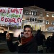 PHOTO: Members of the Greek gay, lesbian and transsexual community protested outside parliament ahead of the ruling(AFP: Louisa Gouliamaki)