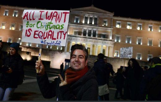 PHOTO: Members of the Greek gay, lesbian and transsexual community protested outside parliament ahead of the ruling(AFP: Louisa Gouliamaki)