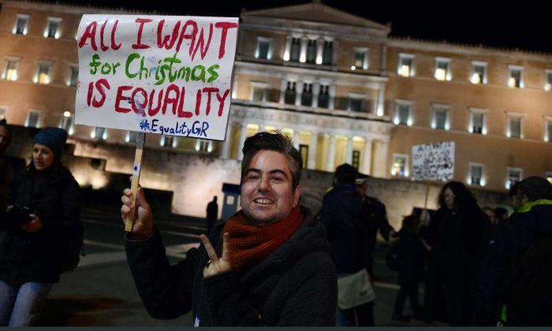 PHOTO: Members of the Greek gay, lesbian and transsexual community protested outside parliament ahead of the ruling(AFP: Louisa Gouliamaki)