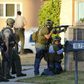 Couple's motive in California rampage a mystery for police, family