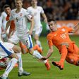 Robin van Persie of the Netherlands falls during the match against Czech Republic during their Euro 2016 group A qualifying soccer match in Amsterdam, Netherlands October 13, 2015. REUTERS/Toussaint Kluiters/United Photos