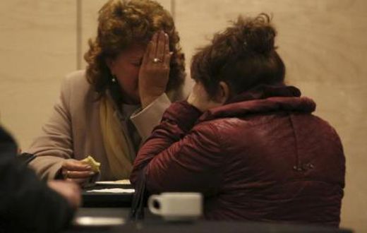 Relatives of victims of a Russian airliner which crashed in Egypt, mourn at a hotel near Pulkovo airport in St. Petersburg, Russia, October 31, 2015. The Airbus A321, operated by Russian airline Kogalymavia under the brand name Metrojet, carrying 224 p...