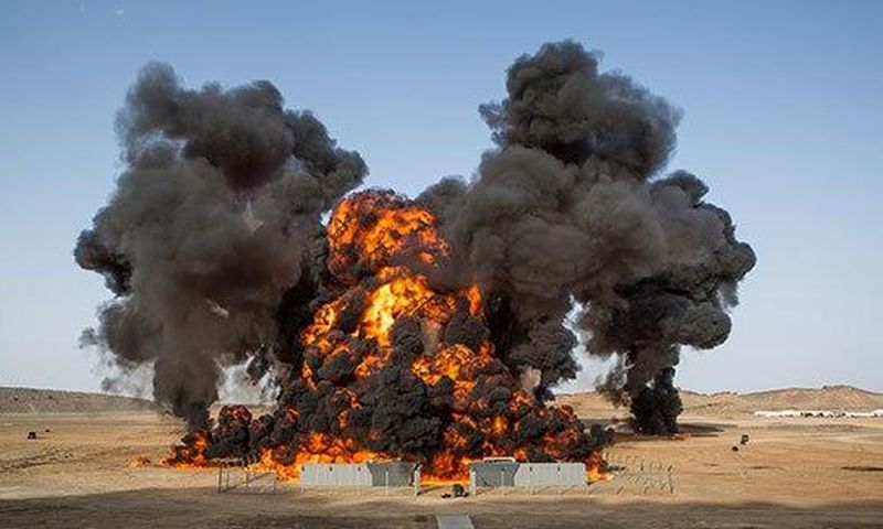 Four oil tanks on fire at Libyan ports after clashes with terrorists