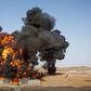 Four oil tanks on fire at Libyan ports after clashes with terrorists