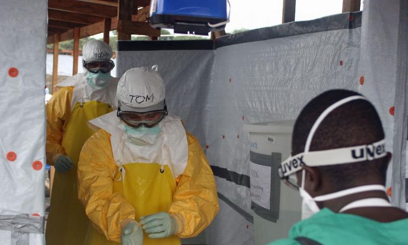 CDC Director Dr. Tom Frieden exits an Ebola treatment unit in West Africa in 2014.