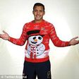 Alexis Sanchez models Arsenal Christmas jumper