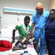 Dr Isaac Okyere attending to one of the seven children who underwent the open heart surgery