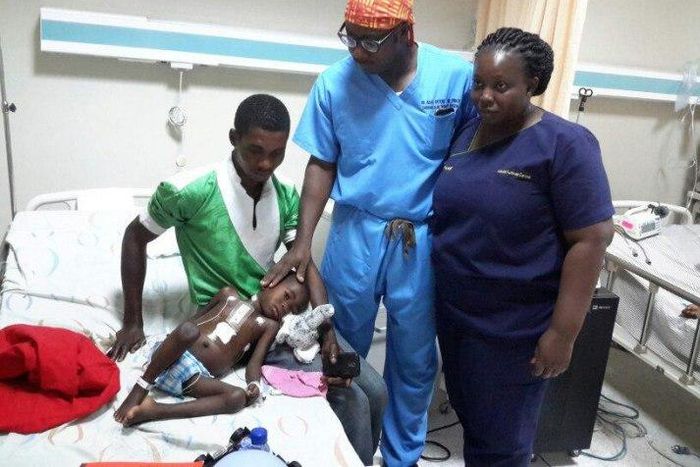 Dr Isaac Okyere attending to one of the seven children who underwent the open heart surgery