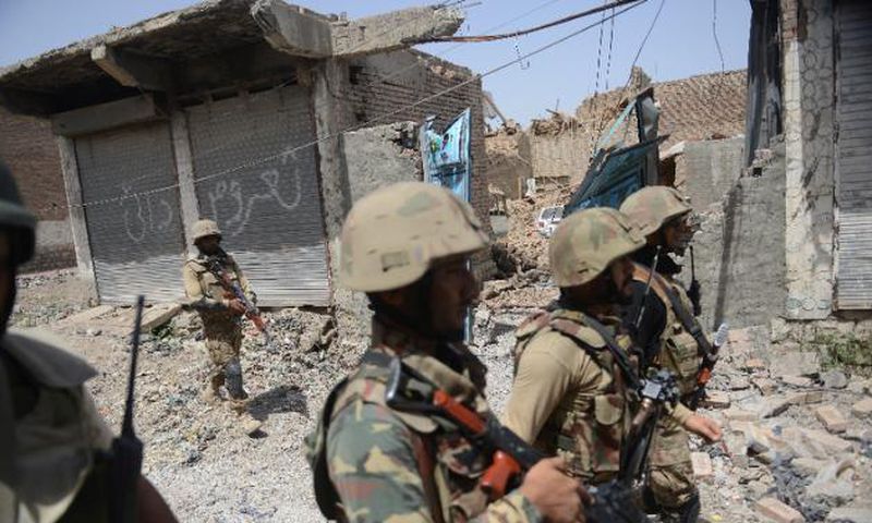 Pakistan says militants firing from Afghanistan kill seven soldiers