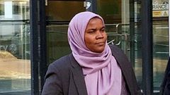 Dr Hadiza Bawa-Garba walking to the court