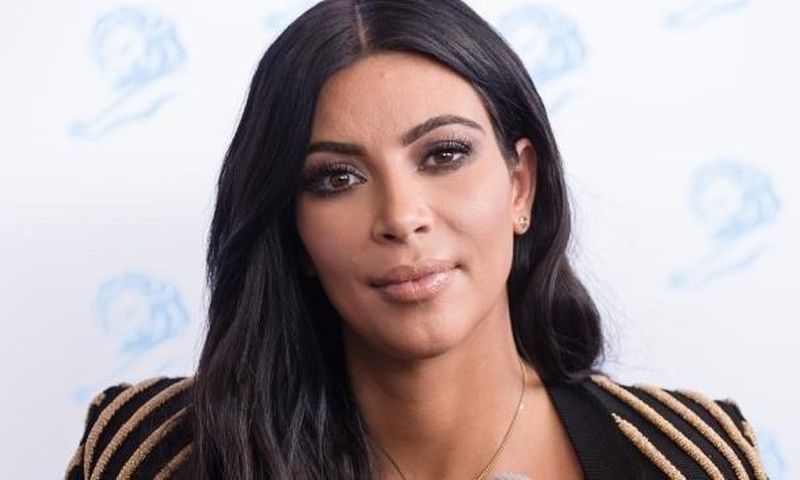Kanye west and Kim Kardashian couple to donate 1000 shoes