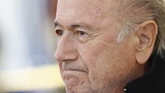 FIFA President Sepp Blatter reacts before the first game of the so-called "Sepp Blatter tournament" in Blatter's home-town Ulrichen, Switzerland, August 22, 2015. REUTERS/Denis Balibouse