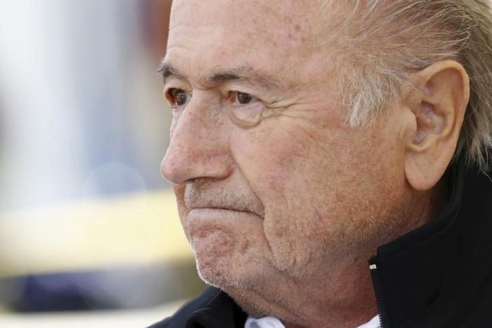 FIFA President Sepp Blatter reacts before the first game of the so-called "Sepp Blatter tournament" in Blatter's home-town Ulrichen, Switzerland, August 22, 2015. REUTERS/Denis Balibouse
