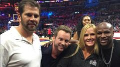 Holly Holm meets Floyd Mayweather