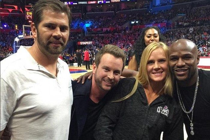 Holly Holm meets Floyd Mayweather