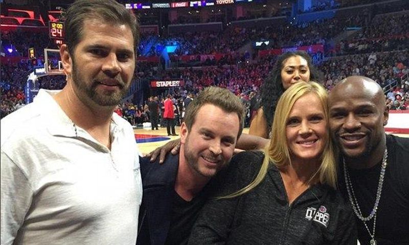Holly Holm meets Floyd Mayweather