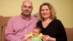 Karolina Dabrowska with partner Matthew Errington and their new born baby.