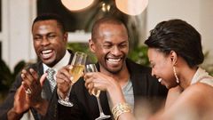Friends talking at a party