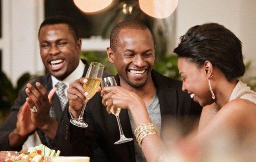 Friends talking at a party