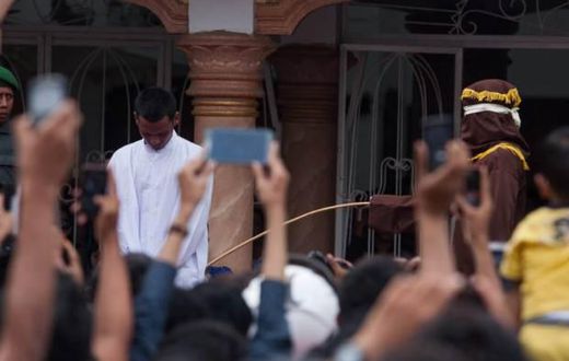 Gay people caught having sex will be caned in public 100 times