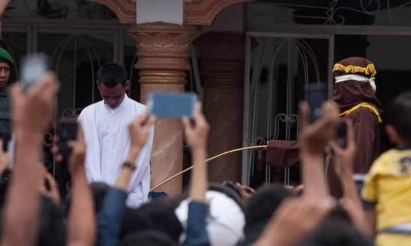 Gay people caught having sex will be caned in public 100 times