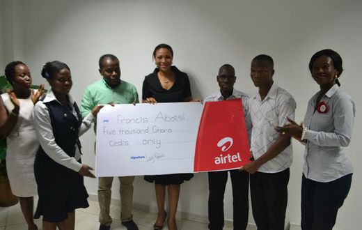 Hannah Agbozo, Legal & Corporate Affairs Director (Middle) and Maruf Lawal, Networks& IT Director (3rd from Left) making the presentation to Mr. Francis Abotsi (2nd from right)