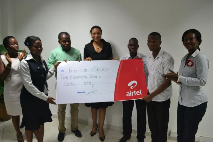 Hannah Agbozo, Legal & Corporate Affairs Director (Middle) and Maruf Lawal, Networks& IT Director (3rd from Left) making the presentation to Mr. Francis Abotsi (2nd from right)