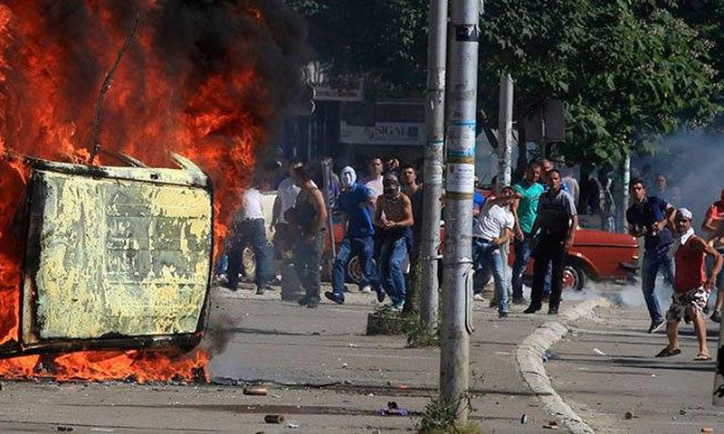 Kosovo police say shots fired, car set on fire in ethnic Serb village