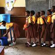 ___4322942___https:______static.pulse.com.gh___webservice___escenic___binary___4322942___2015___11___3___18___students-line-up-in-school-to-wash-hands-accra-ghana