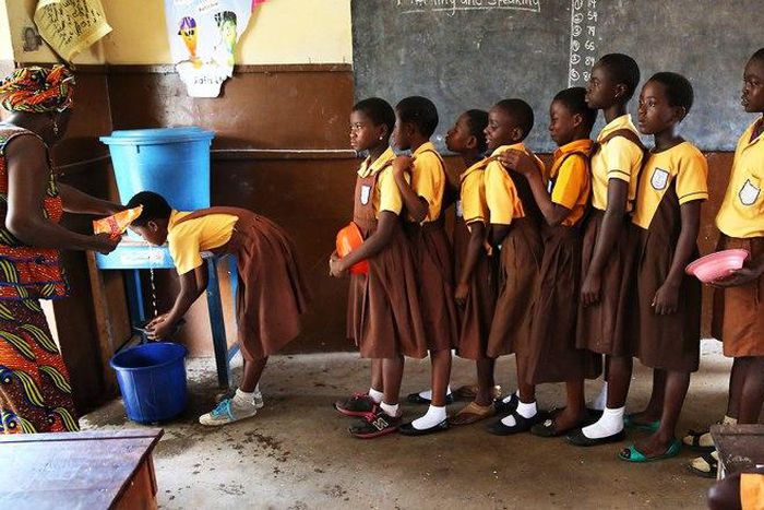 ___4322942___https:______static.pulse.com.gh___webservice___escenic___binary___4322942___2015___11___3___18___students-line-up-in-school-to-wash-hands-accra-ghana