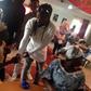 Samini donating his Xmas gift to the aged at Aya Community Clinic