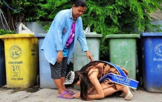 Beauty queen, Khanittha 'Mint' Phasaeng bows before her mum next to a row of wheelie bins