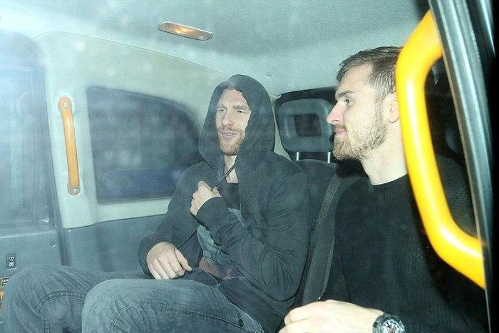 Per Mertesacker and Aaron Ramsey party with their Arsenal teammates at a London nightclub