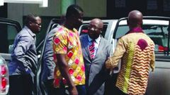 Pastor (in suit) arraigned before court for stealing power