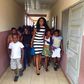 Yvonne Nelson and some pupils of St. Martin De Porres Schoo