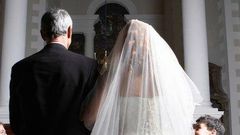 Father walking his daughter down the aisle