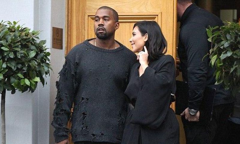 Kanye West in torn Sweater
