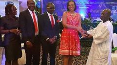 Hannah Agbozo, Legal & Corporate Affairs Director- Airtel Ghana (4 from left) receiving the plaque at the awards.