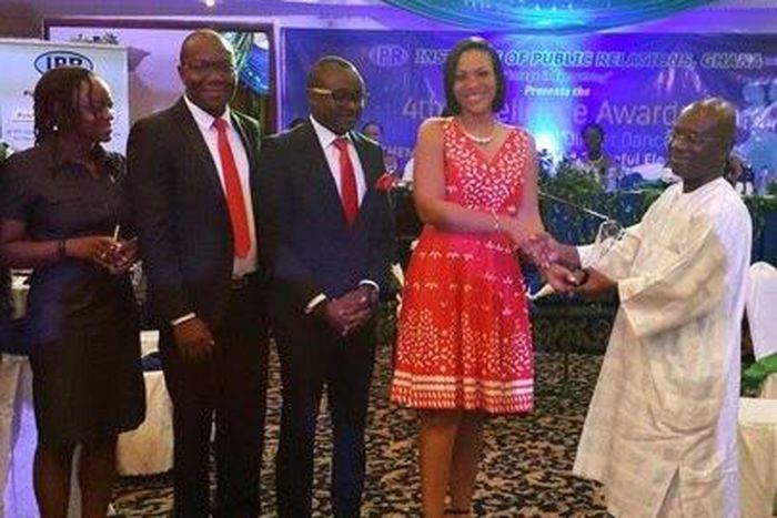 Hannah Agbozo, Legal & Corporate Affairs Director- Airtel Ghana (4 from left) receiving the plaque at the awards.