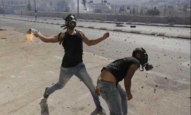 Israeli troops kill West Bank protester in arrest raid -Palestinians